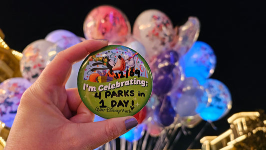 4 Parks 1 Day Celebration Button with balloons in the background