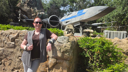Kelly bounding as Rey at Star Wars: Galaxy’s Edge in Disney’s Hollywood Studios