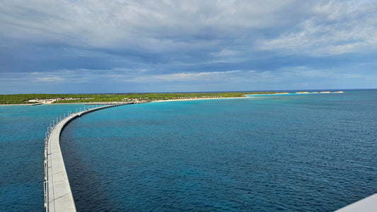 view of the dock and island of Lookout Cay at Lighthouse Point from being onboard a Disney ship