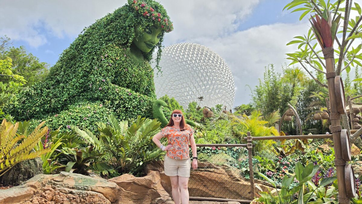 Kelly bounding as Moana at Epcot in front of Te Fiti