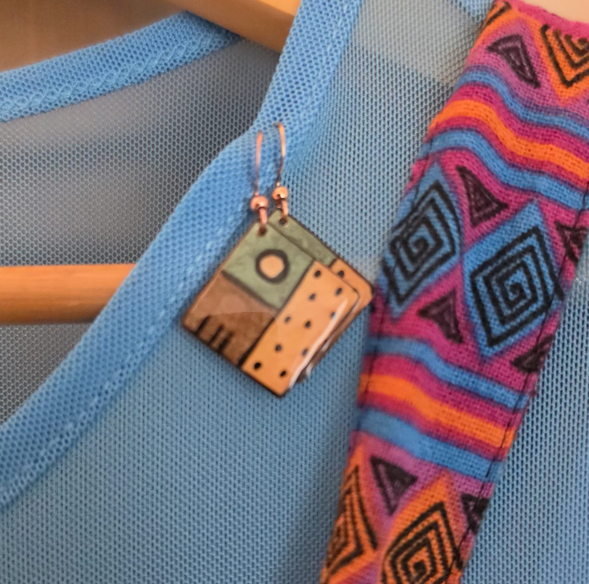 Detailed shot of the earrings in Kelly’s Sally bound