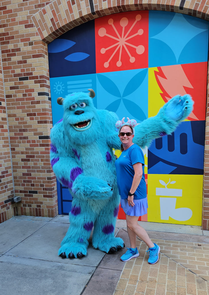 Kelly Character Bounding as Sulley from Monster’s Inc while standing next to Sulley at Disney’s Hollywood Studios