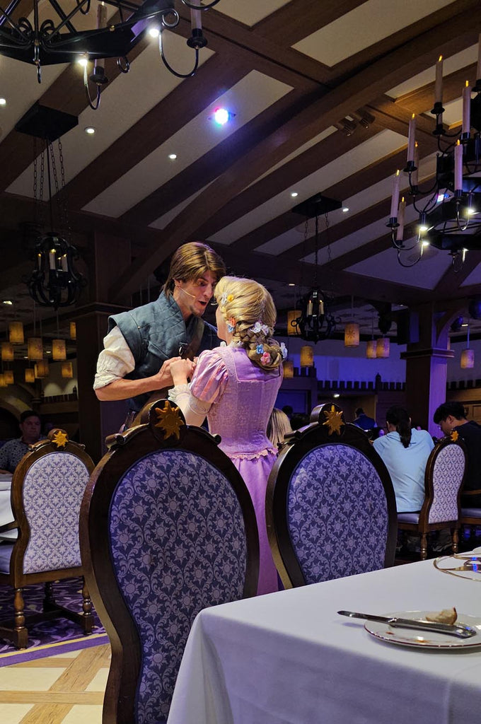 Flynn Rider and Rapunzel’s performing at Rapunzel’s Royal Table on the Disney Magic