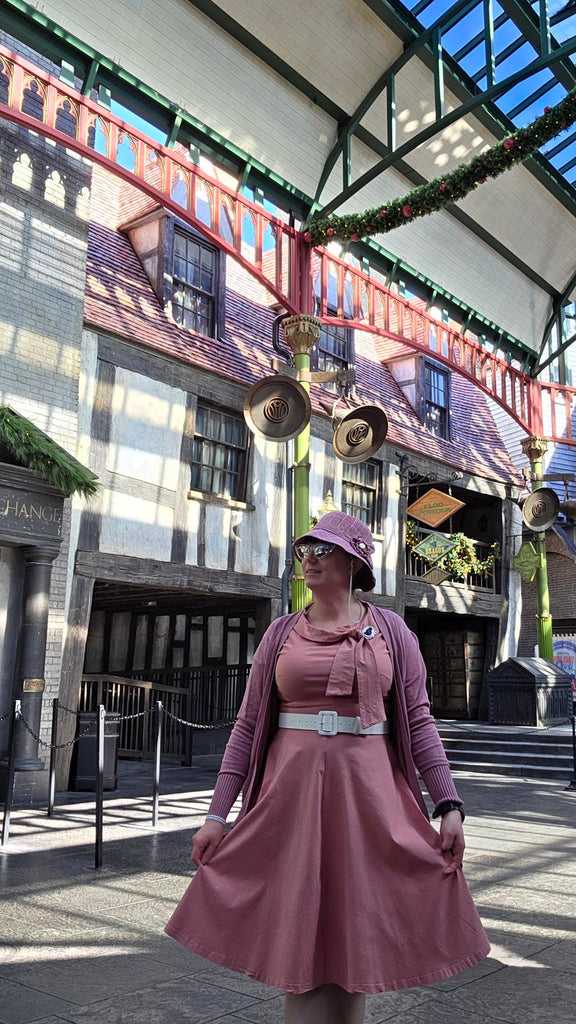 Kelly bounding as Dolores Umbridge in Diagon Alley at Universal Studios Orlando