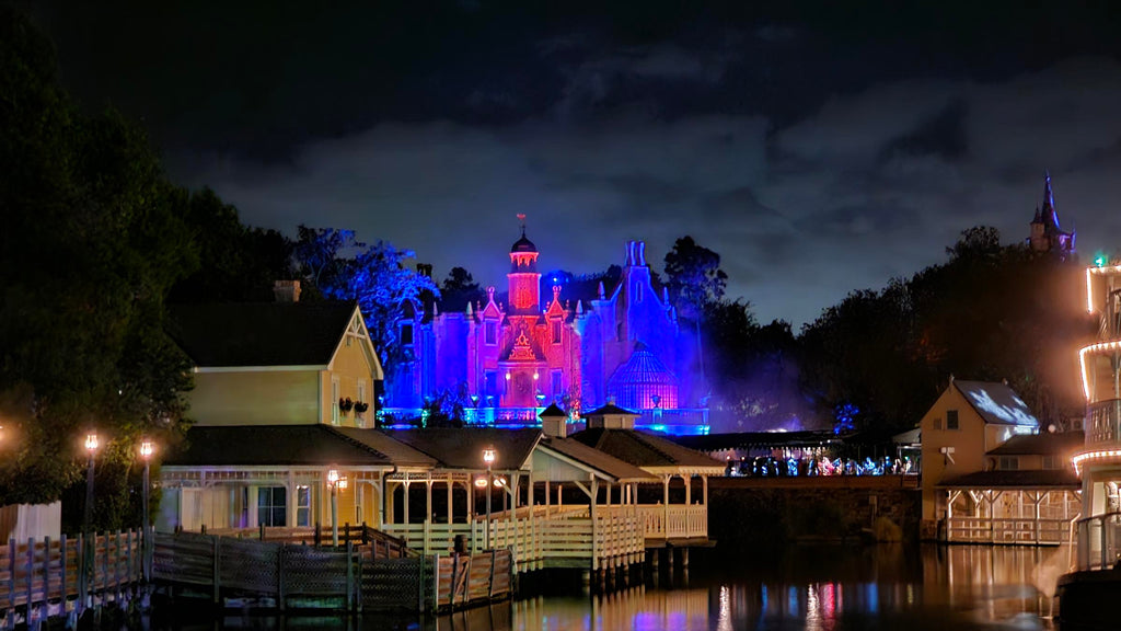 Haunted Mansion lit up with Halloween lighting at the Magic Kingdom
