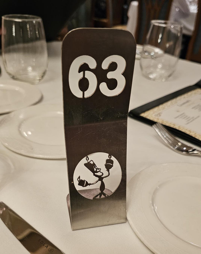 Beauty and the Beast designed table number at Lumiere’s on the Disney Magic