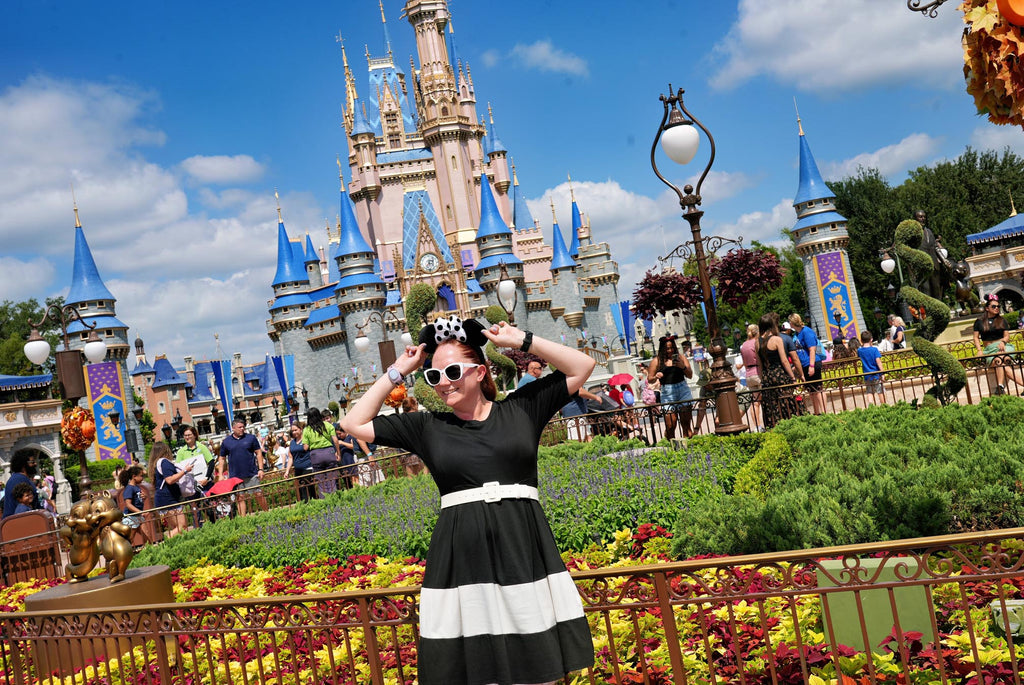 Kelly bounding as Minnie Mouse in Magic Kingdom