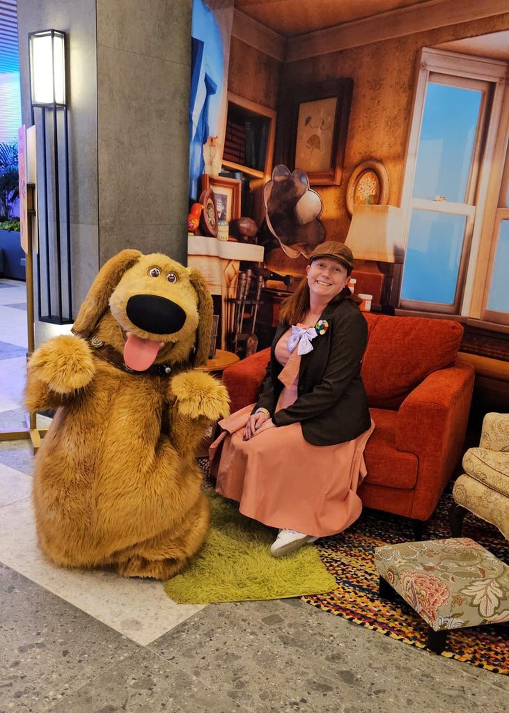 Kelly bounding as Bing Bong in a photo with Dug