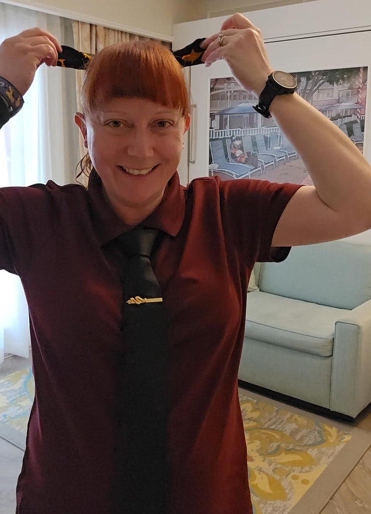 Kelly bounding as Jafar showing the lamp pocket-square tied in her hair