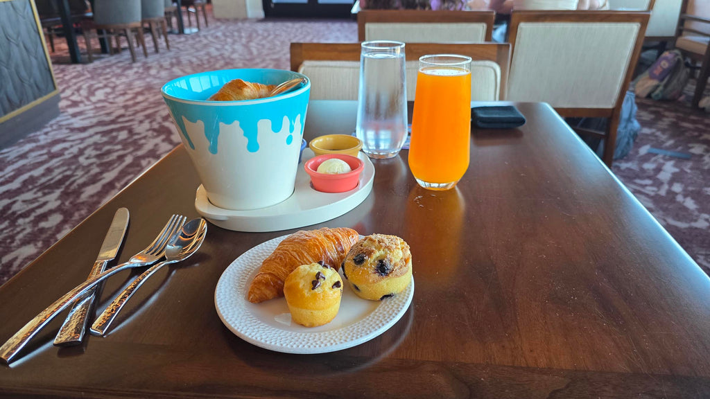 Paint bucket of pastries and juice at Topolino’s Terrace
