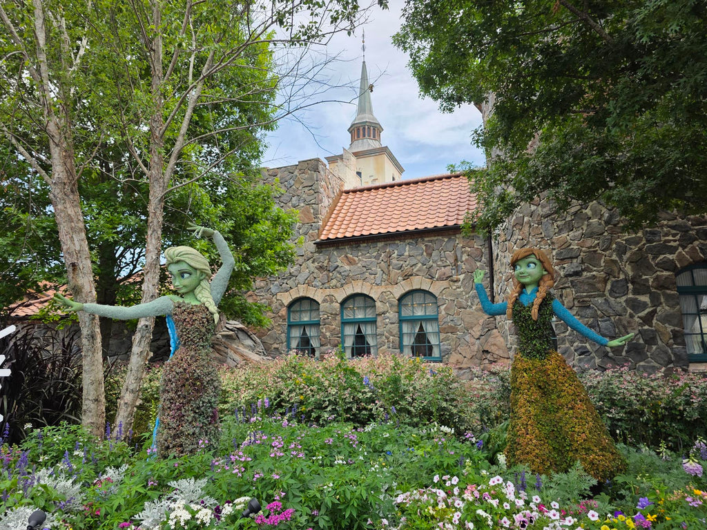 Anna and Elsa topiaries at the Epcot International Flower & Garden Festival