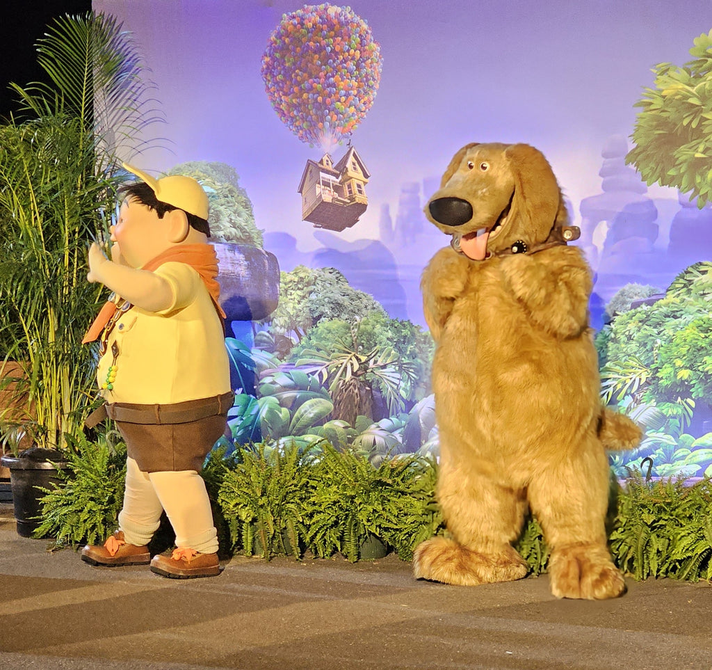 Characters Dug and Russel from UP at the starting line area of the RunDisney 2024 Springtime Surprise 10K
