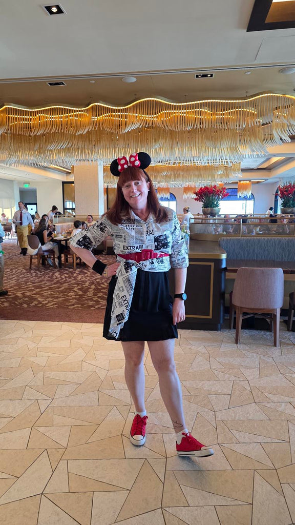 Kelly bounding as Poet Minnie at Topolino’s Terrace