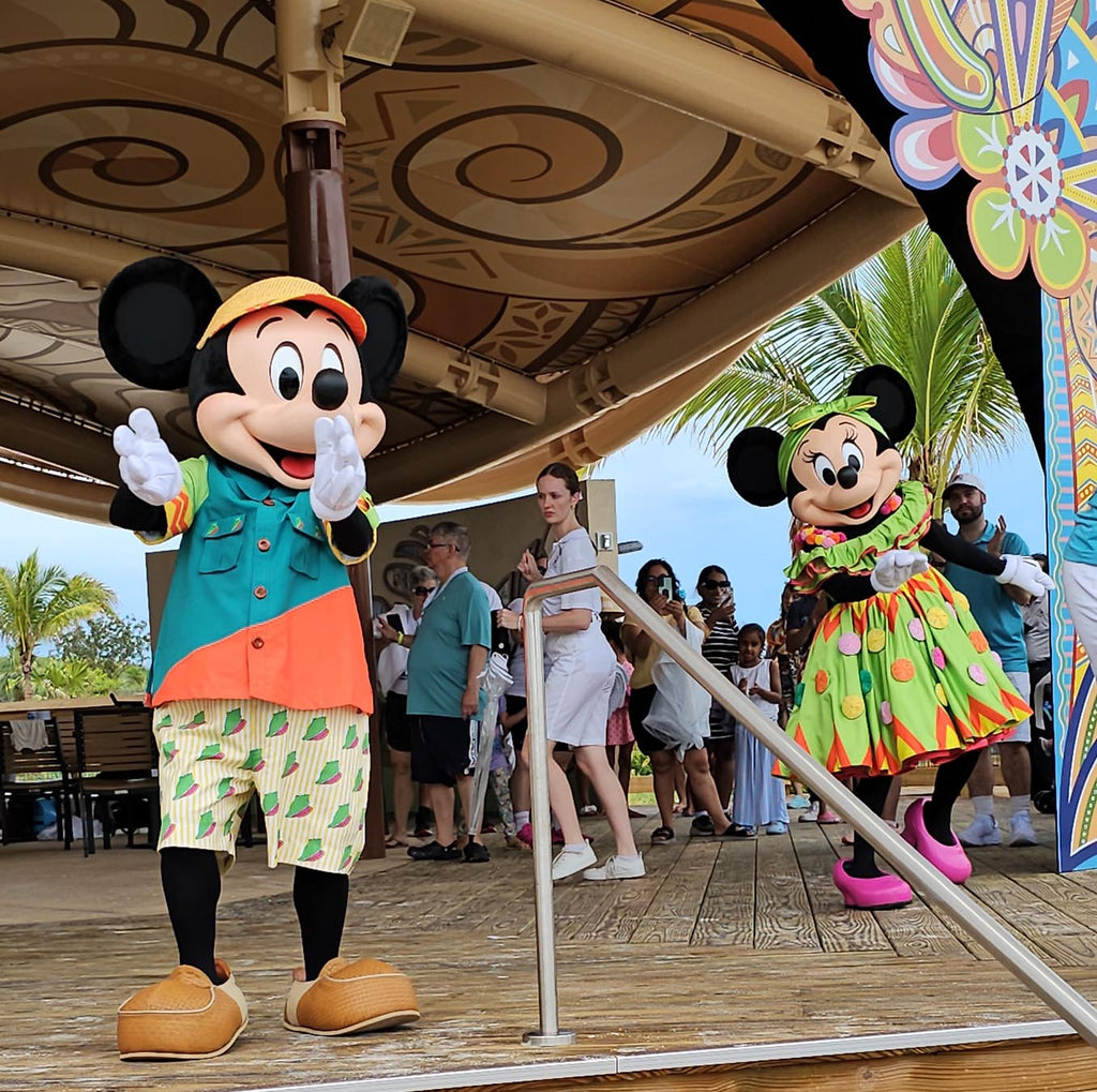 Mickey and Minnie wearing their Lookout Cay at Lighthouse Point outfits