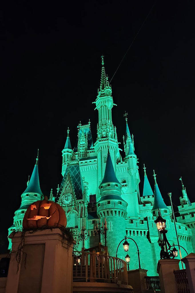 pumpkin in front of Cinderella Castle during MNSSHP