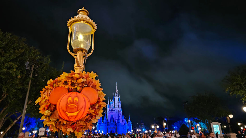 Mickey shaped Halloween wreath in front of Cinderella Castle at Magic Kingdom