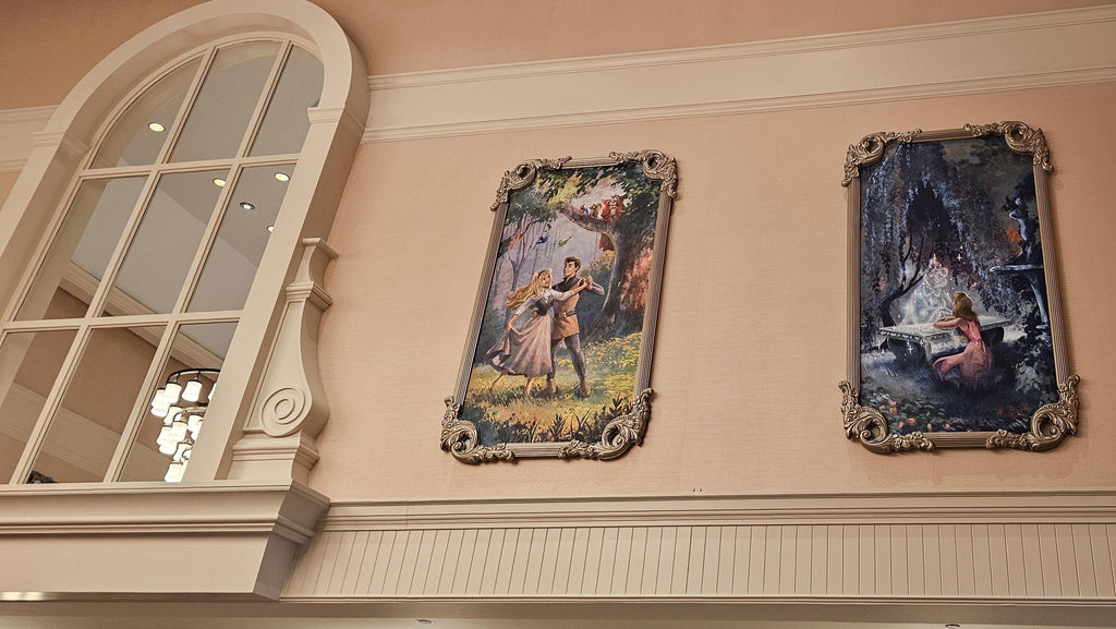 painting of Sleeping Beauty and Cinderella hanging at 1900 Park Fare
