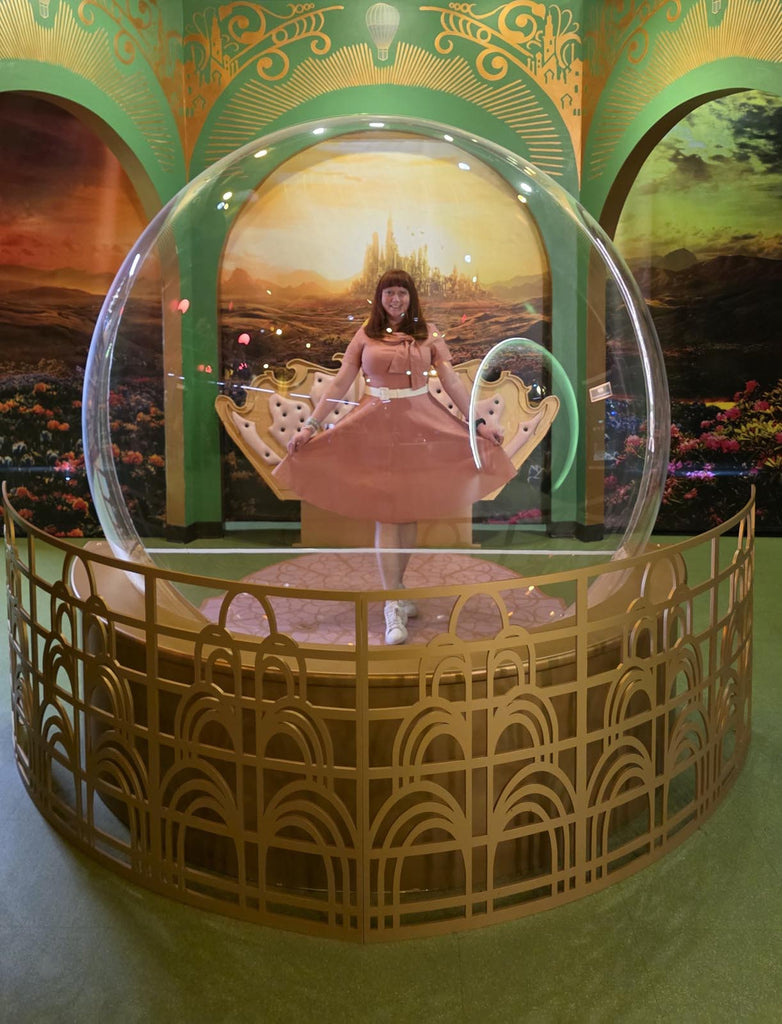 Kelly bounding as Glinda in Glinda’s bubble at Universal Studios Orlando