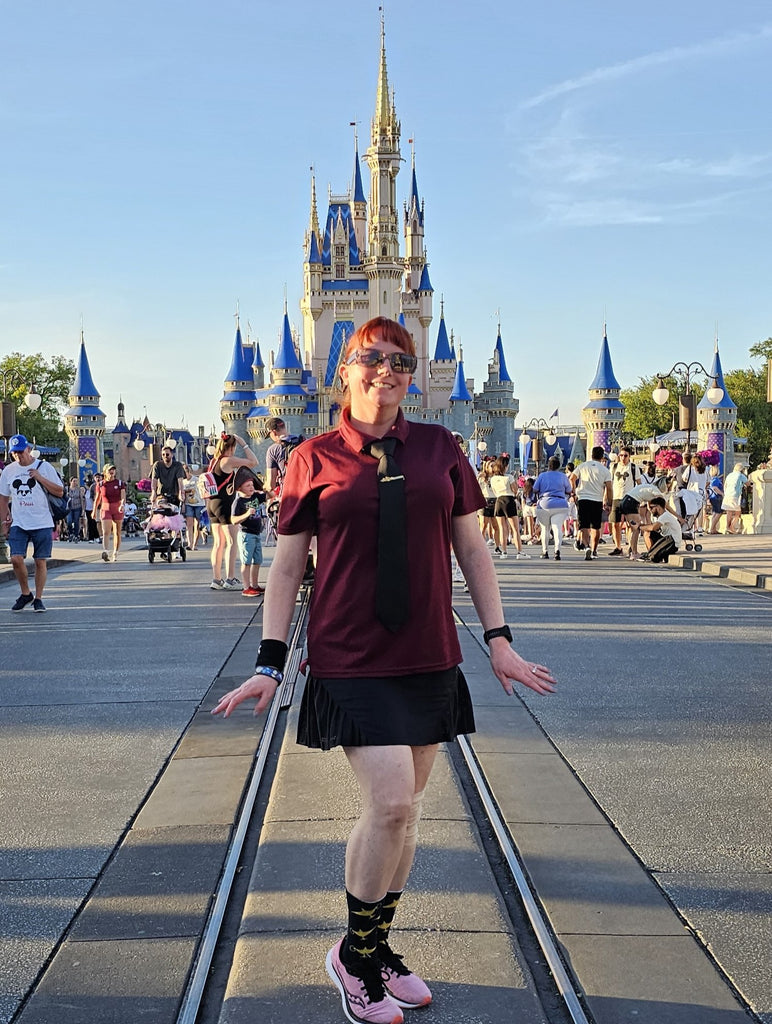 Kelly bounding as Jafar in front of Cinderella Castle