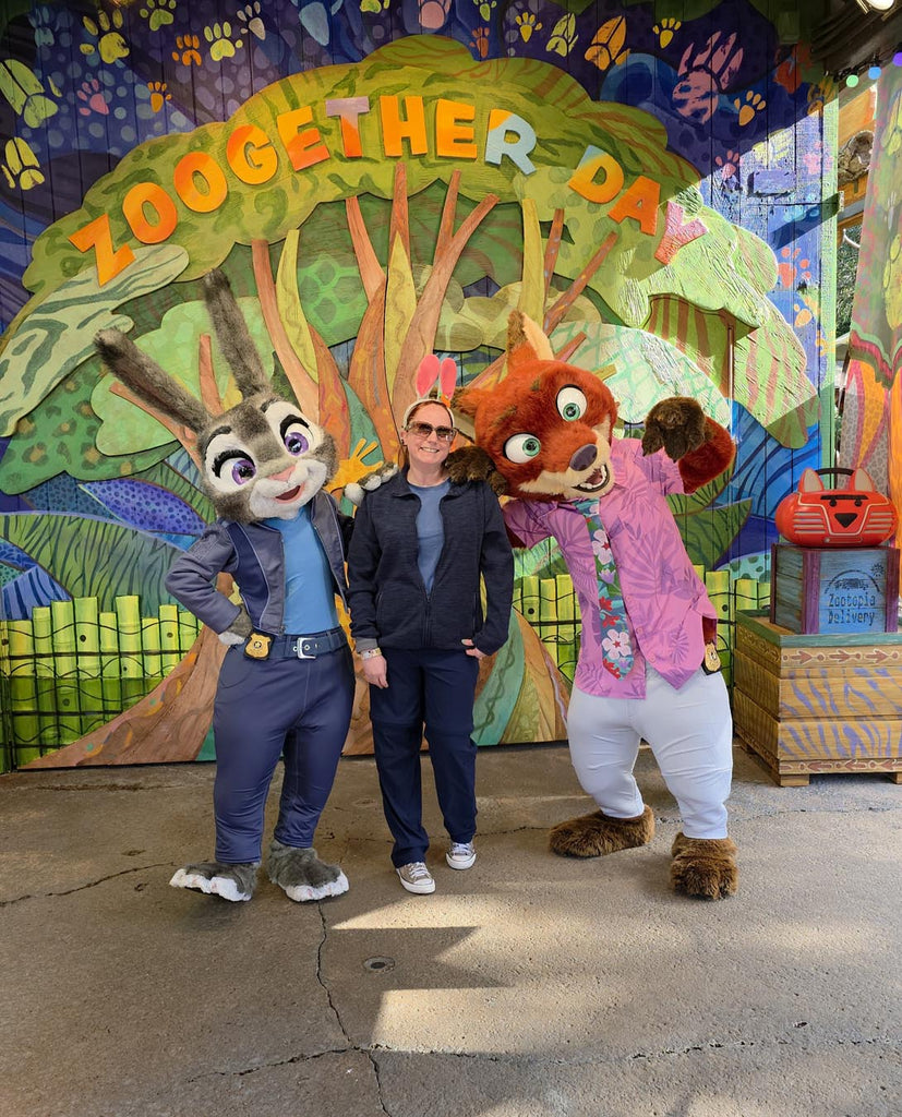Kelly bounding as Judy Hopps while meeting Judy Hopps and Nick Wilde at Disney’s Animal Kingdom