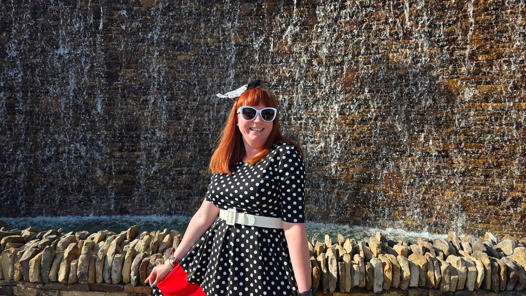 Kelly in a black polka-dot Dapper Day outfit from Spring 2025