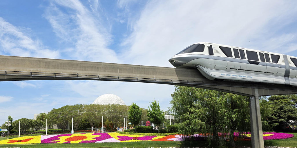 monorail with flower beds and geosphere in the background