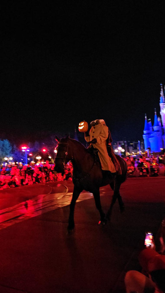 The Headless Horseman riding down Main Street at the Magic Kingdom
