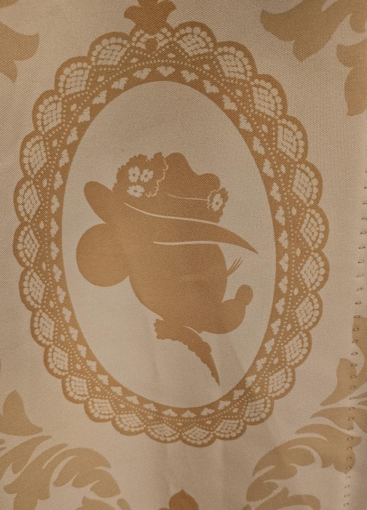Silhouette of Dapper Minnie Mouse from the curtains at Disney’s Boardwalk Villas