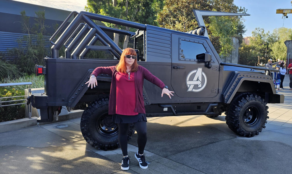 Kelly bounding as Scarlet Witch at Avengers Campus