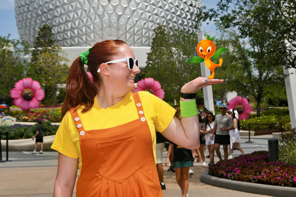 Kelly bounding as Orange Bird at The Epcot International Flower & Garden Festival