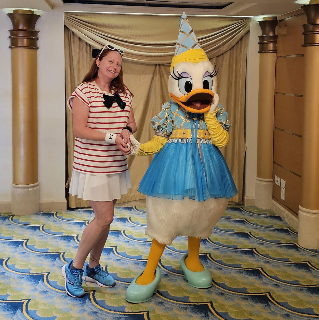 Kelly bounding as Cruise Donald on the Disney Magic and meeting Daisy