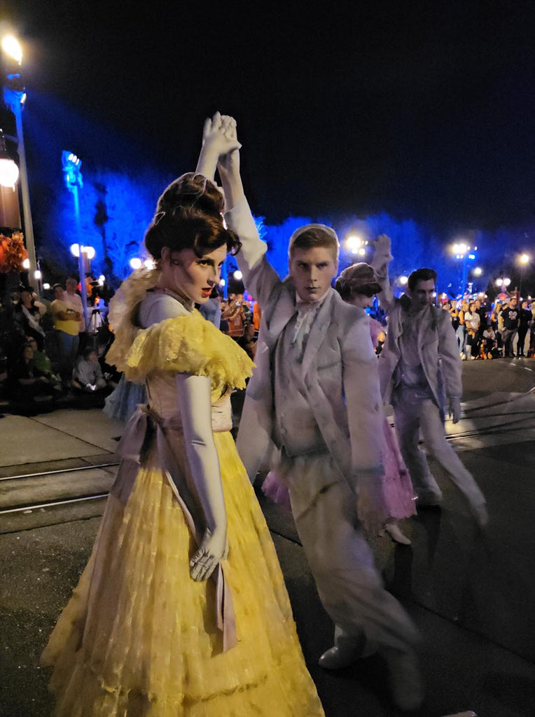 Victorian-style dancers in the Boo-to-You Parade at Magic Kingdom