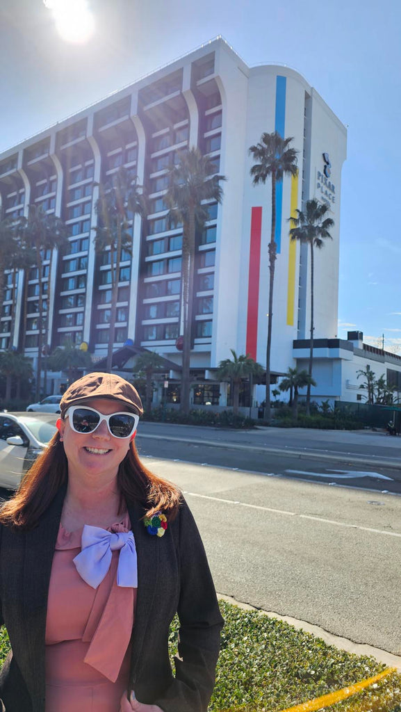 Kelly bounding as Bing Bong outside of Pixar Place in Disneyland