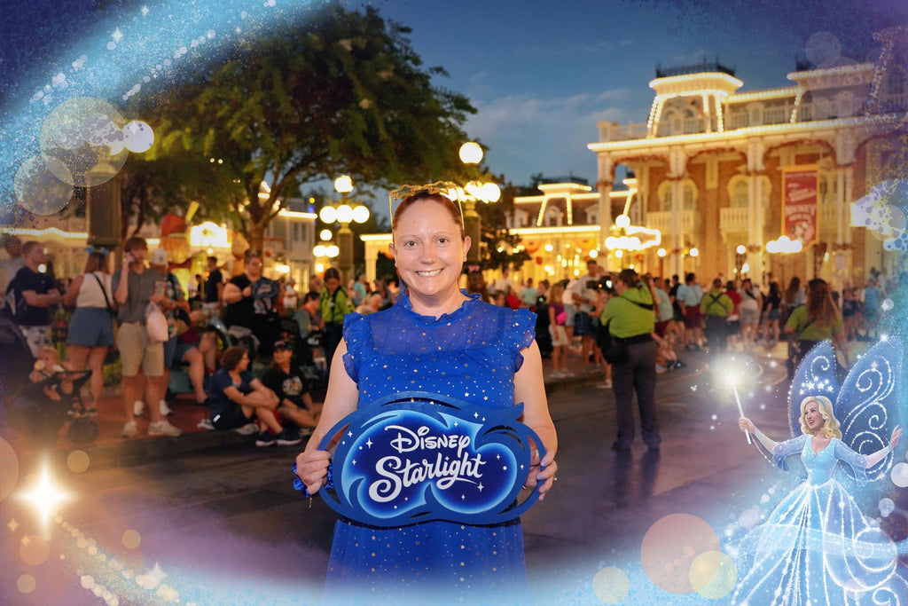 Kelly bounding as the Blue Fairy while holding a sign for Disney Starlight parade at Magic Kingdom