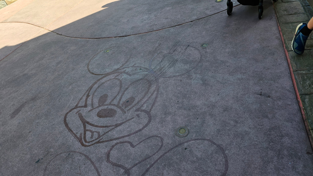 Mickey Mouse water drawing in Magic Kingdom’s Fantasyland