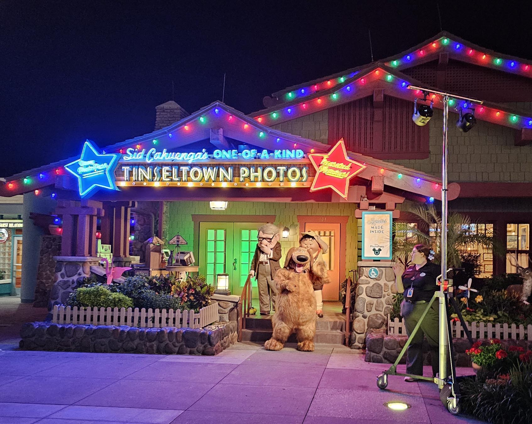 Carl, Dug and Russell from Up greeting people at Disney’s Hollywood Studios