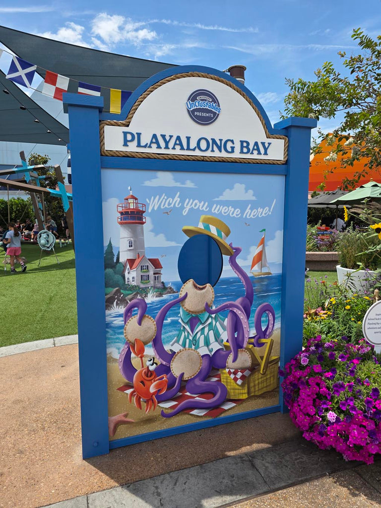 Sign for the Playalong Bay outdoor play area for younger guests at Epcot